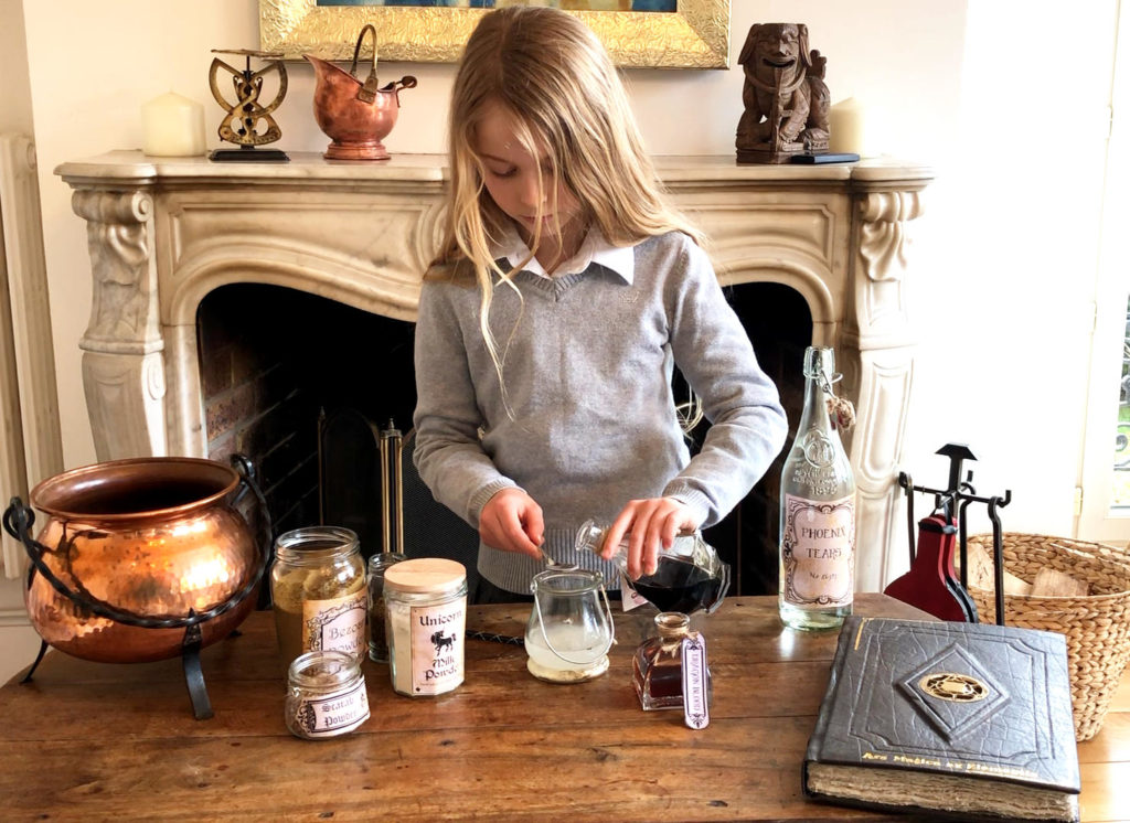 Girl making fun magical activity at home using magical ingredients