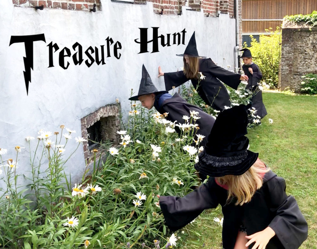 Children dressed like Harry Potter playing treasure hunt